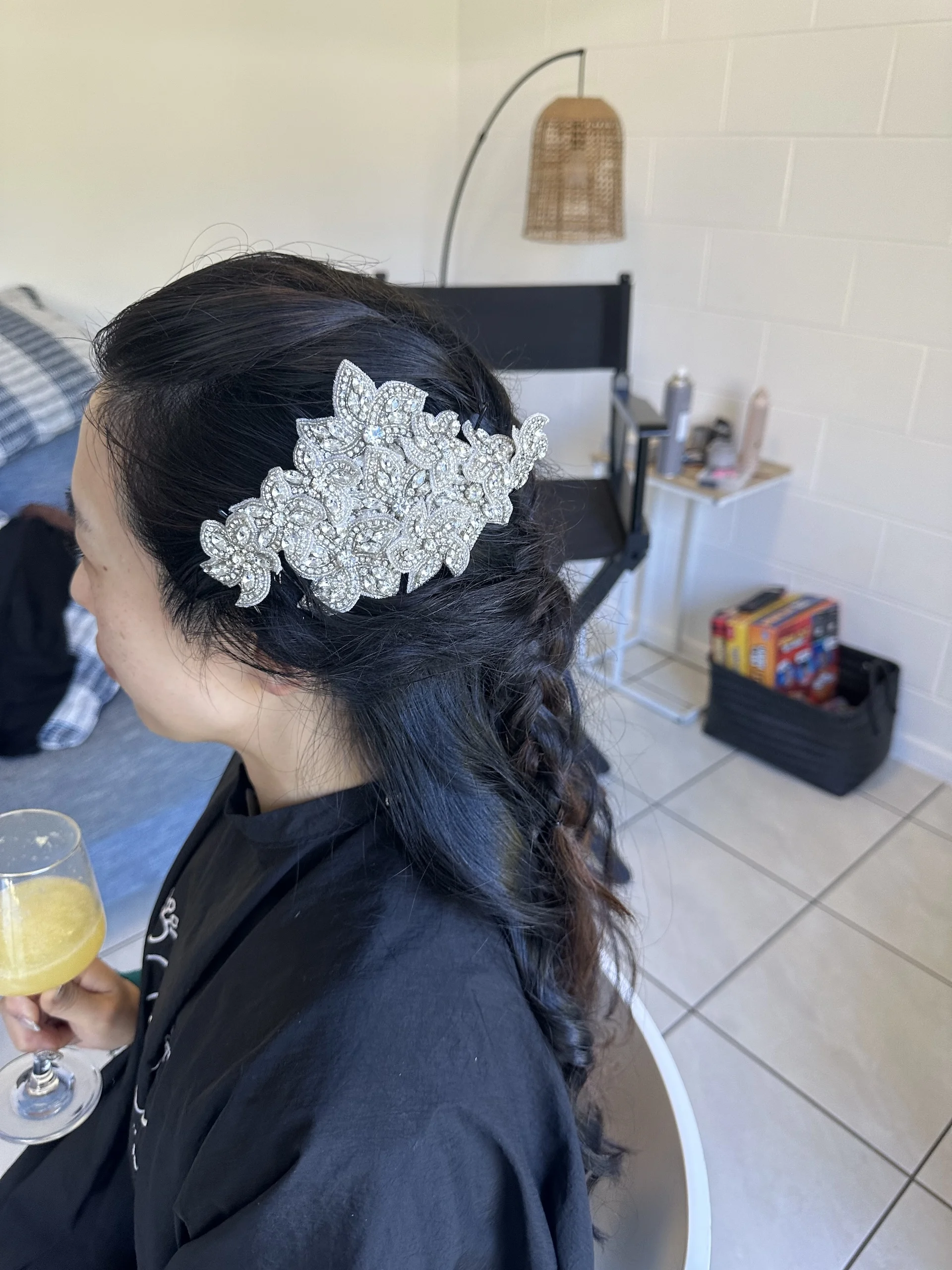 Curled blow wave styling by our Proserpine hairdressers